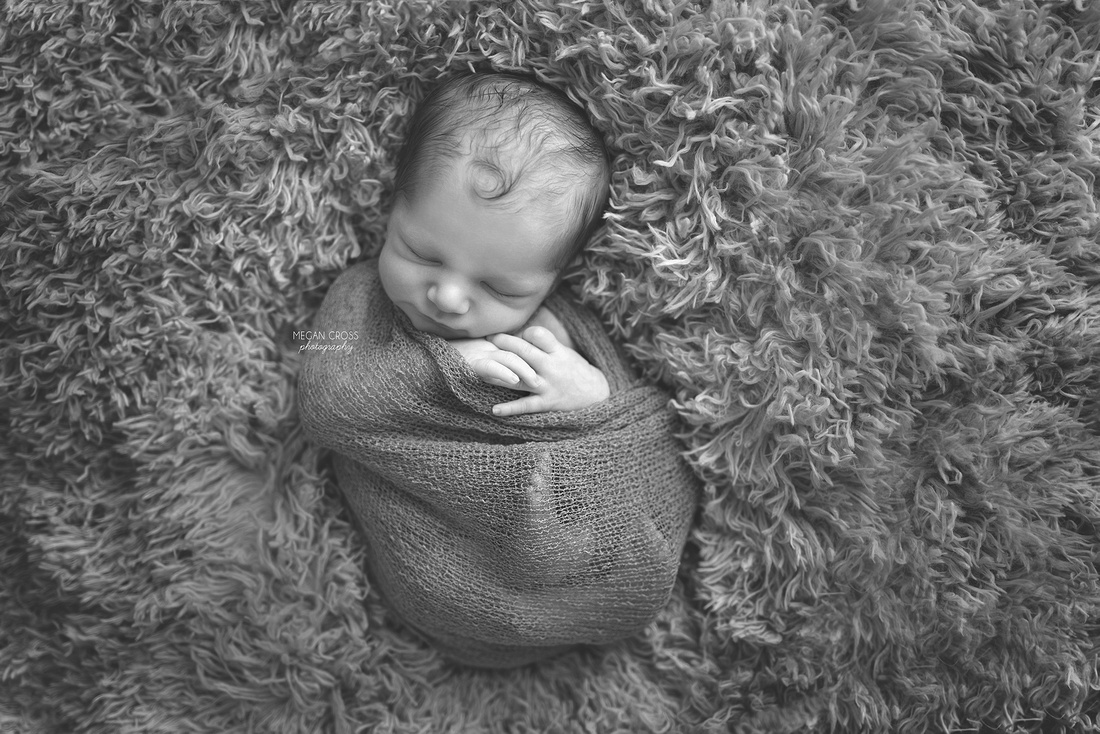 b&w wrapped baby